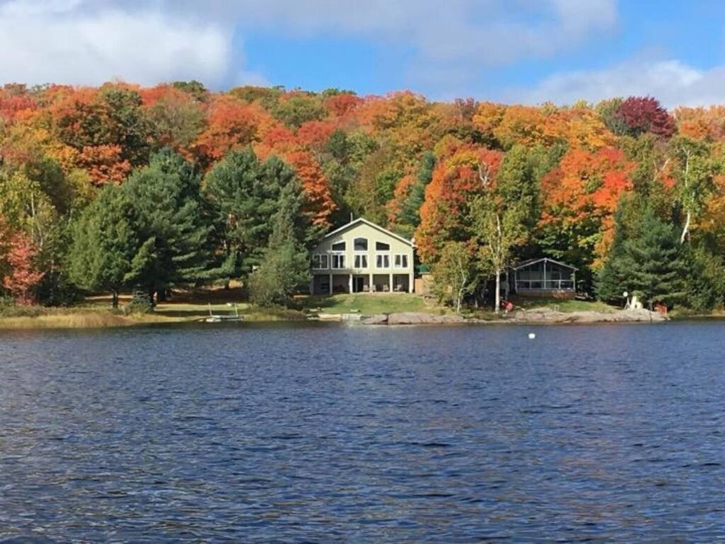 Experience tranquil autumn living—this charming lakeside home offers stunning seasonal views, serene water frontage, and peaceful natural surroundings perfect for relaxation.